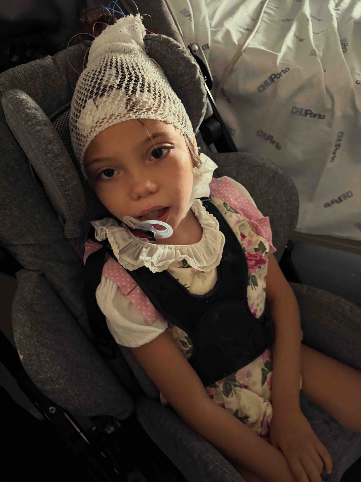 Sarah seated safely in her supportive medical chair